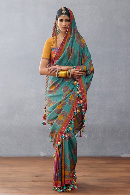 Shop Torani Multi Color Silk Tassels Dil Rang Azaliya Floral Print And Pompom Saree Online at Aza Fashions Shop_Torani_Multi Color Silk Tassels Dil Rang Azaliya Floral Print And Pompom Saree _Online_at_Aza_Fashions
