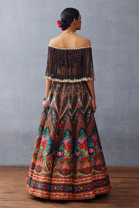 Shop Torani Black Jersey, Silk Pom-poms Off-shoulder Dil Shaad Elnaz Bloom Lehenga Set at Aza Fashions Shop_Torani_Black Jersey, Silk Pom-poms Off-shoulder Dil Shaad Elnaz Bloom Lehenga Set _at_Aza_Fashions