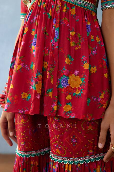 Shop Torani Red Organza, Silk Lace, Tassels Dil Surkh Sabah Printed Peplum Kurta Sharara Set Online at Aza Fashions Shop_Torani_Red Organza, Silk Lace, Tassels Dil Surkh Sabah Printed Peplum Kurta Sharara Set _Online_at_Aza_Fashions