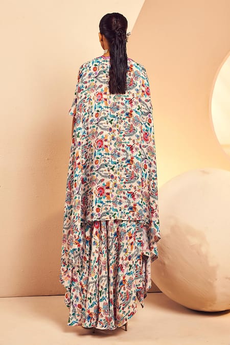 Shop Aneesh Agarwaal White Crepe Sequins, Mirrors, Mexican Folk Print Cape Draped Skirt Set at Aza Fashions Shop_Aneesh Agarwaal_White Crepe Sequins, Mirrors, Mexican Folk Print Cape Draped Skirt Set _at_Aza_Fashions