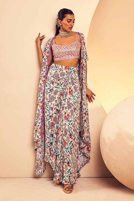 Aneesh Agarwaal White Crepe Sequins, Mirrors, Mexican Folk Print Cape Draped Skirt Set at Aza Fashions Aneesh Agarwaal_White Crepe Sequins, Mirrors, Mexican Folk Print Cape Draped Skirt Set _at_Aza_Fashions
