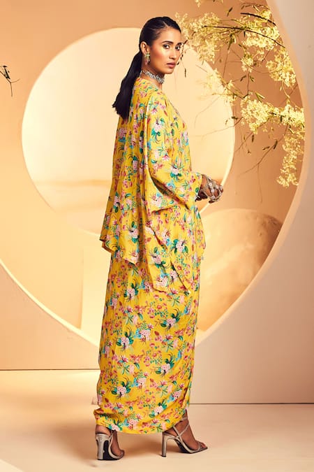 Shop Aneesh Agarwaal Yellow Crepe Embroidery V-neck Floral Chintz Print Poncho With Dhoti Skirt at Aza Fashions Shop_Aneesh Agarwaal_Yellow Crepe Embroidery V-neck Floral Chintz Print Poncho With Dhoti Skirt _at_Aza_Fashions
