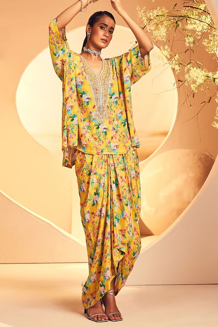Shop Aneesh Agarwaal Yellow Crepe Embroidery V-neck Floral Chintz Print Poncho With Dhoti Skirt Online at Aza Fashions Shop_Aneesh Agarwaal_Yellow Crepe Embroidery V-neck Floral Chintz Print Poncho With Dhoti Skirt _Online_at_Aza_Fashions