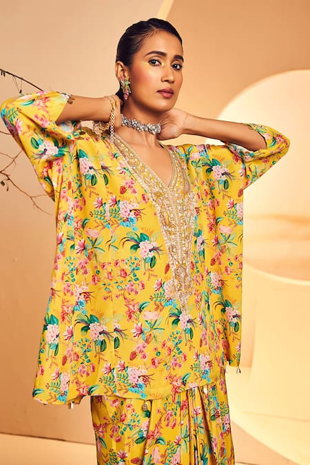 Aneesh Agarwaal Yellow Crepe Embroidery V-neck Floral Chintz Print Poncho With Dhoti Skirt at Aza Fashions Aneesh Agarwaal_Yellow Crepe Embroidery V-neck Floral Chintz Print Poncho With Dhoti Skirt _at_Aza_Fashions