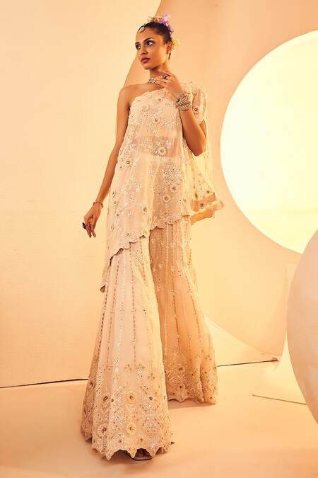 Aneesh Agarwaal Ivory Organza Beads 3d Daisy Embroidered Cape Top With Sharara Online at Aza Fashions Aneesh Agarwaal_Ivory Organza Beads 3d Daisy Embroidered Cape Top With Sharara _Online_at_Aza_Fashions