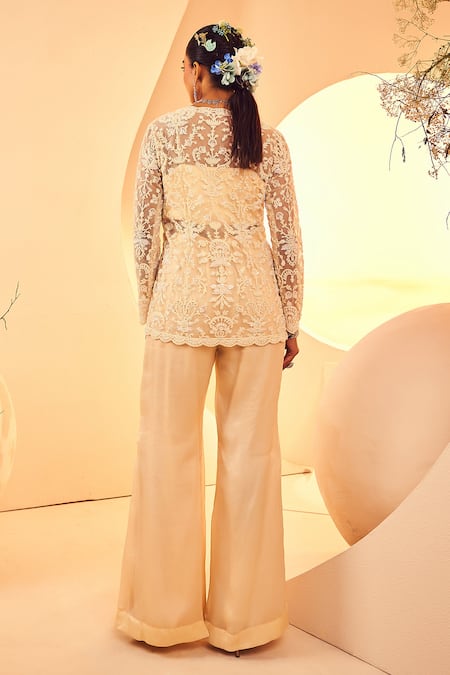 Shop Aneesh Agarwaal Ivory Organza, Satin Pearls, Ethereal Bloom Embroidered Jacket Flared Pant Set at Aza Fashions Shop_Aneesh Agarwaal_Ivory Organza, Satin Pearls, Ethereal Bloom Embroidered Jacket Flared Pant Set _at_Aza_Fashions