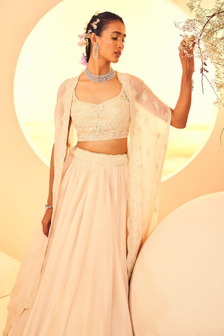 Shop_Aneesh Agarwaal_Ivory Organza Sequins, Beads, Cut Work Lily Bloom Embroidered Cape Lehenga Set _Online_at_Aza_Fashions