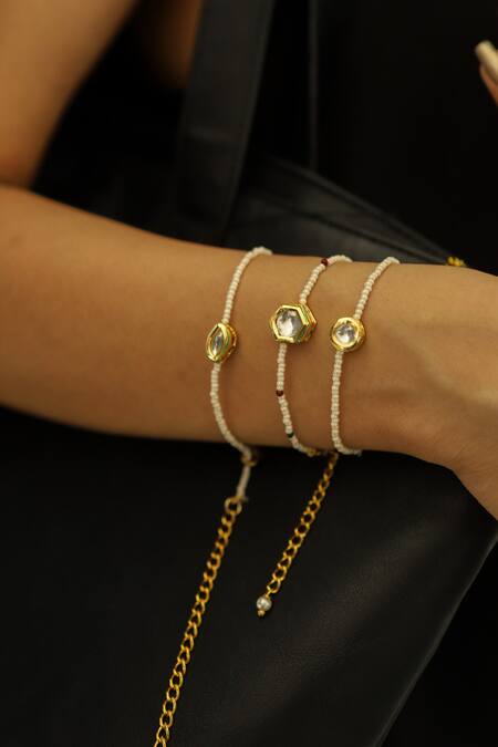 Shop Do Taara Gold Plated Crystals Kundan Embellished 3 Pcs Bracelet at Aza Fashions Shop_Do Taara_Gold Plated Crystals Kundan Embellished 3 Pcs Bracelet _at_Aza_Fashions