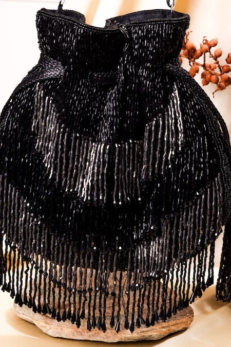 Shop The Purple Sack Black Cut Work Cutdana Tassel Embroidered Potli at Aza Fashions Shop_The Purple Sack_Black Cut Work Cutdana Tassel Embroidered Potli _at_Aza_Fashions