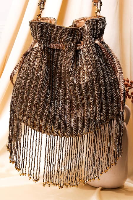 Shop The Purple Sack Brown Cut Work, Beads Tassel Embroidered Potli Bag at Aza Fashions Shop_The Purple Sack_Brown Cut Work, Beads Tassel Embroidered Potli Bag _at_Aza_Fashions