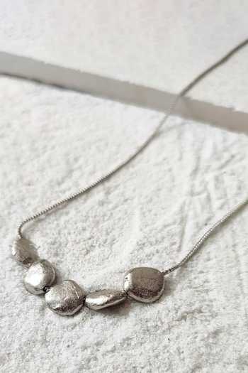 Buy DE'Anma Silver Plated Mea Abstract Stone Pendant Necklace at Aza Fashions Buy_DE'Anma_Silver Plated Mea Abstract Stone Pendant Necklace _at_Aza_Fashions