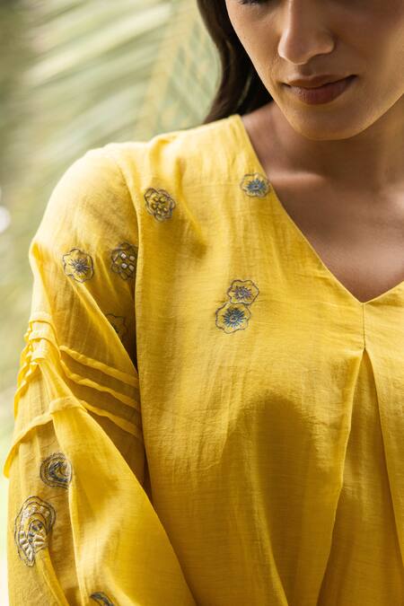 Buy Vaayu Yellow Muslin, Cotton Embroidery, Applique V-neck Rue Floral Dress Online at Aza Fashions Buy_Vaayu_Yellow Muslin, Cotton Embroidery, Applique V-neck Rue Floral Dress_Online_at_Aza_Fashions