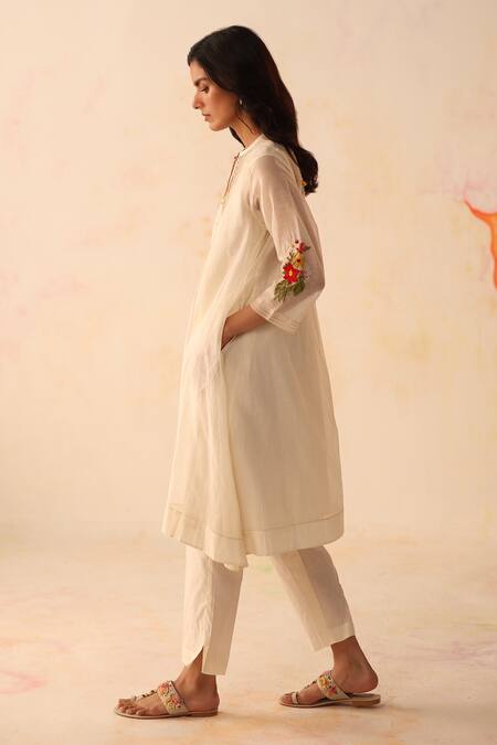 Buy Begum Ivory Chanderi Silk, Cotton Embroidery, Zari, Tassels Round Aqsa Hand Kurta Set Online at Aza Fashions Buy_Begum_Ivory Chanderi Silk, Cotton Embroidery, Zari, Tassels Round Aqsa Hand Kurta Set _Online_at_Aza_Fashions