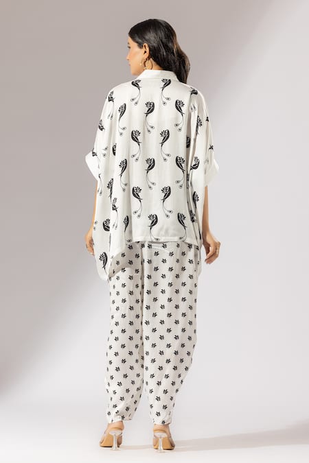 Shop Thee Modern Roots Ivory Silk Satin Collared Bird Paradise Print Boxy Shirt With Salwar Pant at Aza Fashions Shop_Thee Modern Roots_Ivory Silk Satin Collared Bird Paradise Print Boxy Shirt With Salwar Pant _at_Aza_Fashions