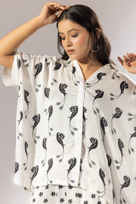 Thee Modern Roots Ivory Silk Satin Collared Bird Paradise Print Boxy Shirt With Salwar Pant at Aza Fashions Thee Modern Roots_Ivory Silk Satin Collared Bird Paradise Print Boxy Shirt With Salwar Pant _at_Aza_Fashions