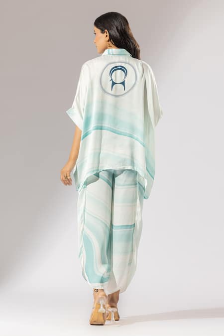 Shop Thee Modern Roots Blue Silk Satin Collared Elements Of Nature Print Boxy Shirt And Pant Set at Aza Fashions Shop_Thee Modern Roots_Blue Silk Satin Collared Elements Of Nature Print Boxy Shirt And Pant Set _at_Aza_Fashions