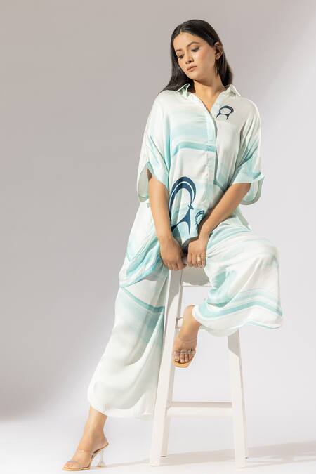 Thee Modern Roots Blue Silk Satin Collared Elements Of Nature Print Boxy Shirt And Pant Set at Aza Fashions Thee Modern Roots_Blue Silk Satin Collared Elements Of Nature Print Boxy Shirt And Pant Set _at_Aza_Fashions