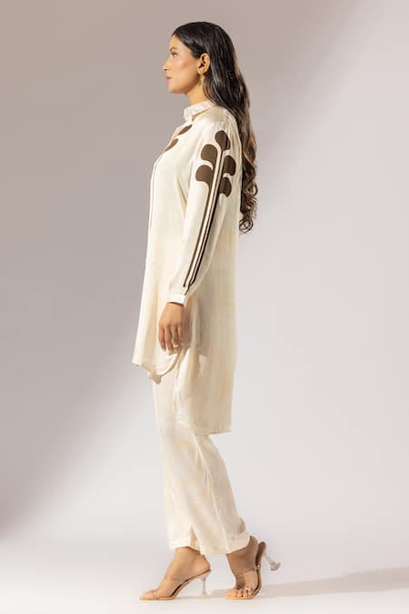 Shop Thee Modern Roots Beige Silk Satin Embroidery Daffodil Marble Swirl High Low Kurta With Pant Online at Aza Fashions Shop_Thee Modern Roots_Beige Silk Satin Embroidery Daffodil Marble Swirl High Low Kurta With Pant _Online_at_Aza_Fashions