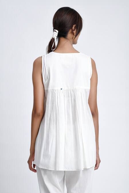 JAYATI GOENKA White Cotton Split V-neck Flared Top And Pant Set at Aza Fashions JAYATI GOENKA_White Cotton Split V-neck Flared Top And Pant Set _at_Aza_Fashions