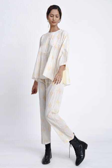 JAYATI GOENKA Yellow Cotton Round Neck Block Print Top And Pant Set at Aza Fashions JAYATI GOENKA_Yellow Cotton Round Neck Block Print Top And Pant Set _at_Aza_Fashions