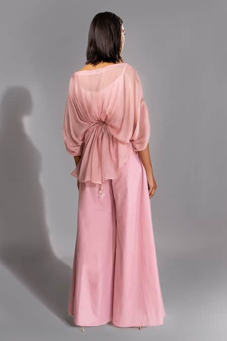 Shop Shruti S Pink Organza, Modal, Cotton Sequins, Cut Batwing Top And Bell Bottom Trouser Set at Aza Fashions Shop_Shruti S_Pink Organza, Modal, Cotton Sequins, Cut Batwing Top And Bell Bottom Trouser Set _at_Aza_Fashions