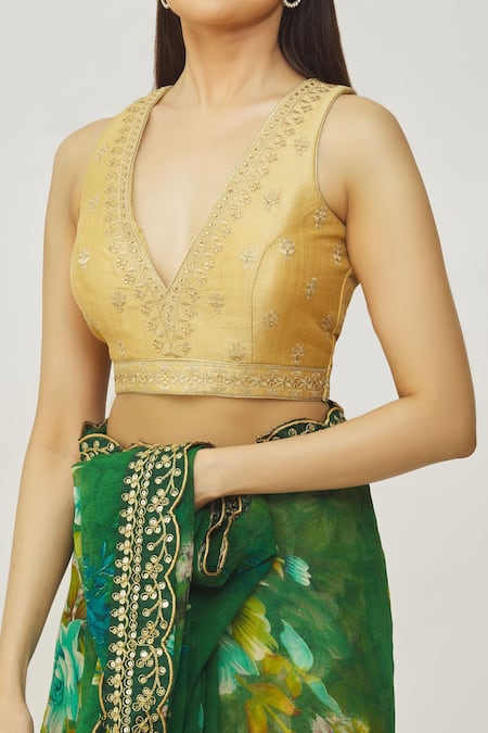 Samyukta Singhania_Gold , Satin Embroidery Plunge Neck V Blouse _at_Aza_Fashions