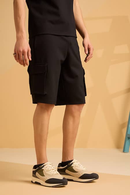 Muvazo Black Cotton, Polyester Onyx Oasis Organic Shorts at Aza Fashions Muvazo_Black Cotton, Polyester Onyx Oasis Organic Shorts _at_Aza_Fashions