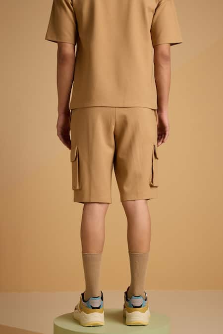 Shop Muvazo Brown Cotton, Polyester Caramel Knee Length Shorts at Aza Fashions Shop_Muvazo_Brown Cotton, Polyester Caramel Knee Length Shorts _at_Aza_Fashions