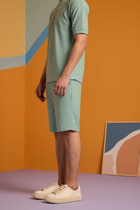 Shop Muvazo Green Cotton, Polyester Maverick Jacquard Knee Length Shorts Online at Aza Fashions Shop_Muvazo_Green Cotton, Polyester Maverick Jacquard Knee Length Shorts _Online_at_Aza_Fashions