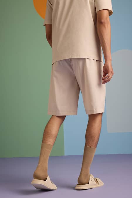 Shop Muvazo Beige Cotton Sunbeam Shorts at Aza Fashions Shop_Muvazo_Beige Cotton Sunbeam Shorts _at_Aza_Fashions