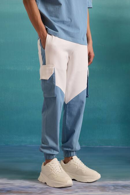 Muvazo Blue Cotton, Polyester Coastal Mist Colorblock Joggers Online at Aza Fashions Muvazo_Blue Cotton, Polyester Coastal Mist Colorblock Joggers _Online_at_Aza_Fashions
