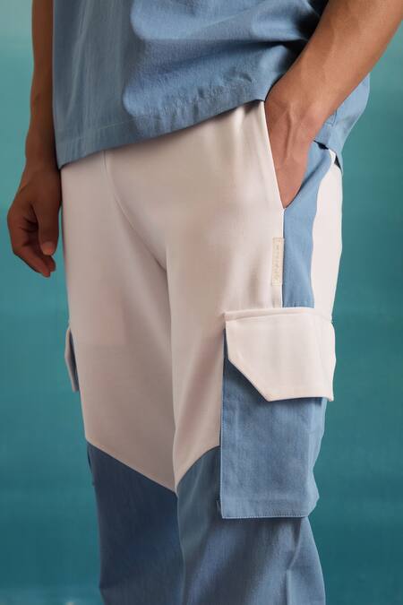Shop Muvazo Blue Cotton, Polyester Coastal Mist Colorblock Joggers Online at Aza Fashions Shop_Muvazo_Blue Cotton, Polyester Coastal Mist Colorblock Joggers _Online_at_Aza_Fashions