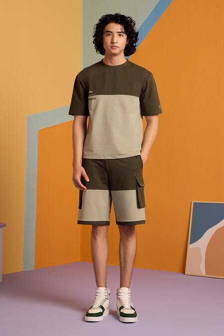 Shop_Muvazo_Green Cotton, Polyester Chromatic Crazee Typographic Pattern Tee _Online_at_Aza_Fashions