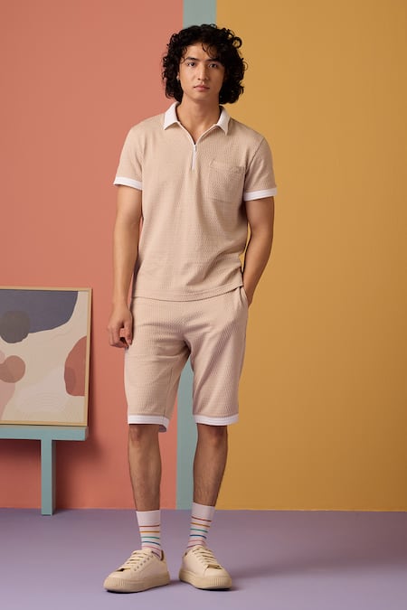 Shop Muvazo Peach Jacquard Sunlit Sienna Woven Zip Tee at Aza Fashions Shop_Muvazo_Peach Jacquard Sunlit Sienna Woven Zip Tee _at_Aza_Fashions