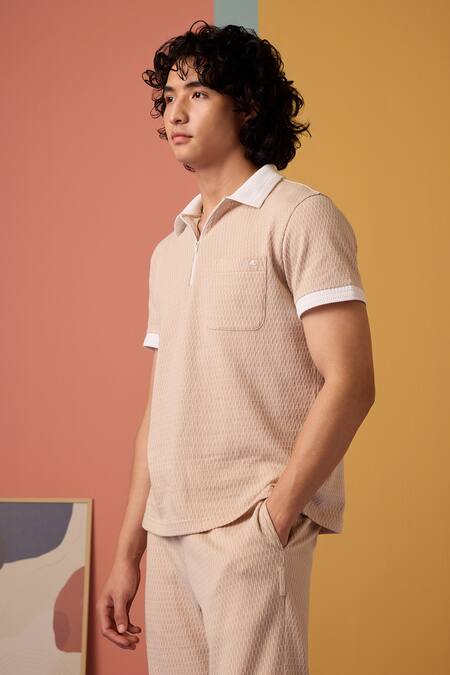 Shop Muvazo Peach Jacquard Sunlit Sienna Woven Zip Tee Online at Aza Fashions Shop_Muvazo_Peach Jacquard Sunlit Sienna Woven Zip Tee _Online_at_Aza_Fashions