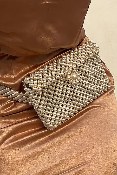 Rubilon Beige Fabric Flowers, Beads Diana Pearl Woven Belt Bag Online at Aza Fashions Rubilon_Beige Fabric Flowers, Beads Diana Pearl Woven Belt Bag _Online_at_Aza_Fashions