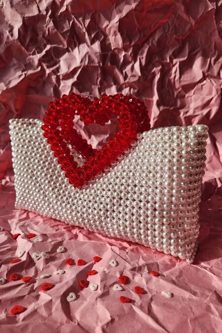 Rubilon White Acrylic Crystal Heartlet Pearl Woven Bag Online at Aza Fashions Rubilon_White Acrylic Crystal Heartlet Pearl Woven Bag _Online_at_Aza_Fashions