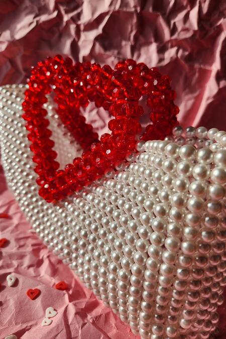 Buy Rubilon White Acrylic Crystal Heartlet Pearl Woven Bag Online at Aza Fashions Buy_Rubilon_White Acrylic Crystal Heartlet Pearl Woven Bag _Online_at_Aza_Fashions