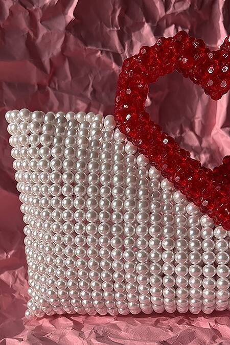 Shop Rubilon White Acrylic Crystal Heartlet Pearl Woven Bag Online at Aza Fashions Shop_Rubilon_White Acrylic Crystal Heartlet Pearl Woven Bag _Online_at_Aza_Fashions