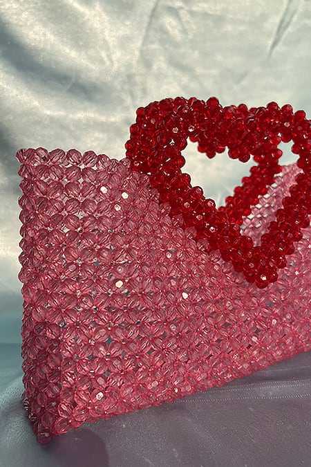 Rubilon_Pink Acrylic Crystal Woven Handbag With Heart Handle _Online_at_Aza_Fashions