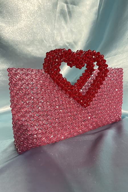 Shop_Rubilon_Pink Acrylic Crystal Woven Handbag With Heart Handle _Online_at_Aza_Fashions