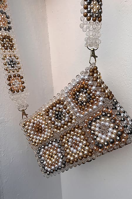 RUBILON Brown Acrylic Crystal Amber Woven Bag