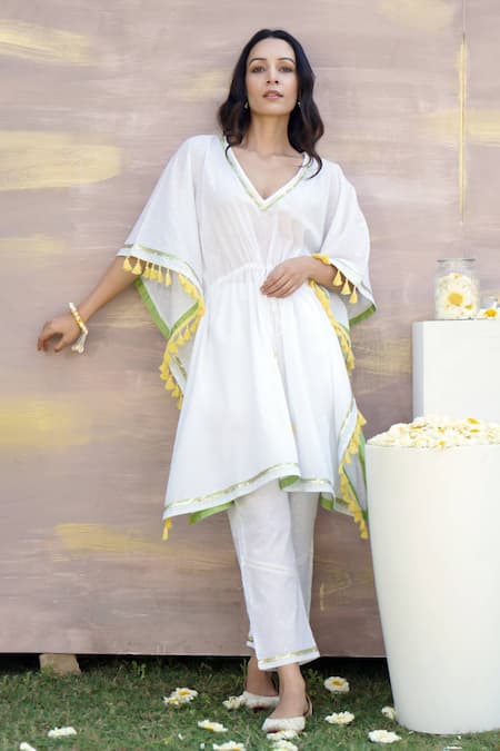 Buy Nero India Ivory Cotton Tassels V-neck Gota Lace Embellished Kaftan Tunic And Pant Set Online at Aza Fashions Buy_Nero India_Ivory Cotton Tassels V-neck Gota Lace Embellished Kaftan Tunic And Pant Set _Online_at_Aza_Fashions