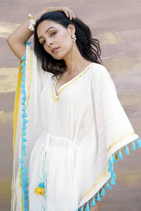 Buy Nero India Ivory Cotton Tassels, Gota Patti Lace Embellished Kaftan Tunic And Pant Set Online at Aza Fashions Buy_Nero India_Ivory Cotton Tassels, Gota Patti Lace Embellished Kaftan Tunic And Pant Set _Online_at_Aza_Fashions