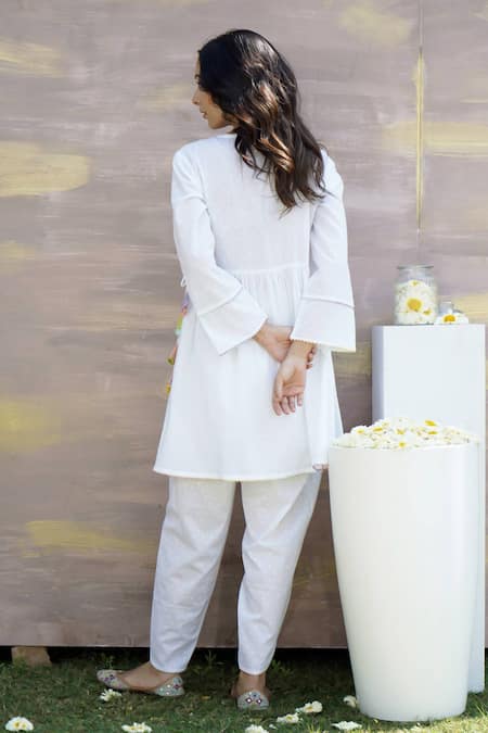 Shop Nero India White Cotton Tassels, Gota Patti Embellished Angarkha Anarkali And Dhoti Pant Set at Aza Fashions Shop_Nero India_White Cotton Tassels, Gota Patti Embellished Angarkha Anarkali And Dhoti Pant Set _at_Aza_Fashions