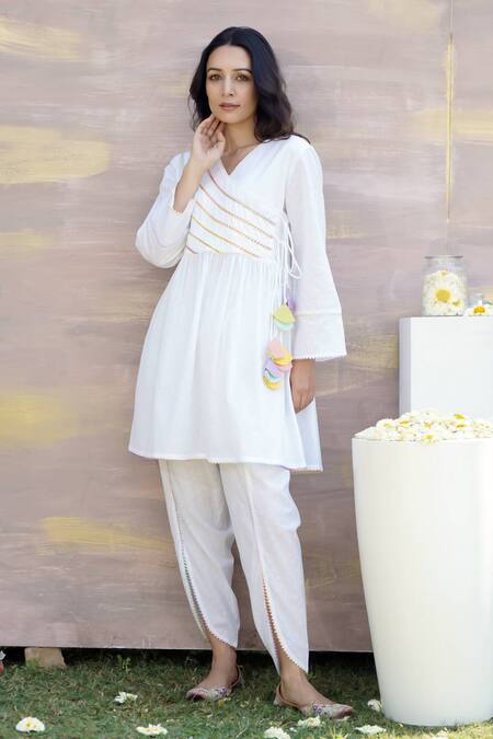 Nero India White Cotton Tassels, Gota Patti Embellished Angarkha Anarkali And Dhoti Pant Set Online at Aza Fashions Nero India_White Cotton Tassels, Gota Patti Embellished Angarkha Anarkali And Dhoti Pant Set _Online_at_Aza_Fashions