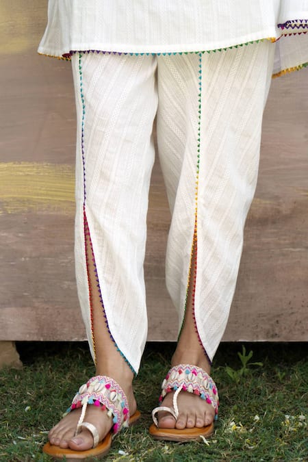 Shop Nero India White Cotton Tassels Gota Lace Embellished Angarkha Anarkali And Dhoti Pant Set Online at Aza Fashions Shop_Nero India_White Cotton Tassels Gota Lace Embellished Angarkha Anarkali And Dhoti Pant Set _Online_at_Aza_Fashions