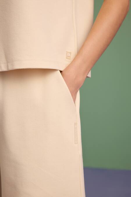 Muvazo Beige Cotton, Polyester Halter Neck Oh So Cool Hoodie With Shorts Online at Aza Fashions Muvazo_Beige Cotton, Polyester Halter Neck Oh So Cool Hoodie With Shorts _Online_at_Aza_Fashions