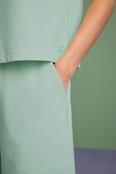 Muvazo_Green Cotton, Polyester Halter Neck Oh So Cool Hooded Tee With Shorts _at_Aza_Fashions