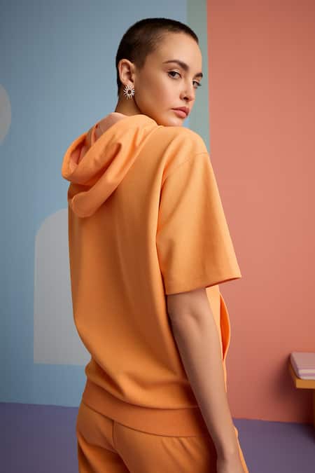 Muvazo_Orange Cotton, Polyester Halter Neck Zest Solid Hoodie Top And Joggers Set _Online_at_Aza_Fashions